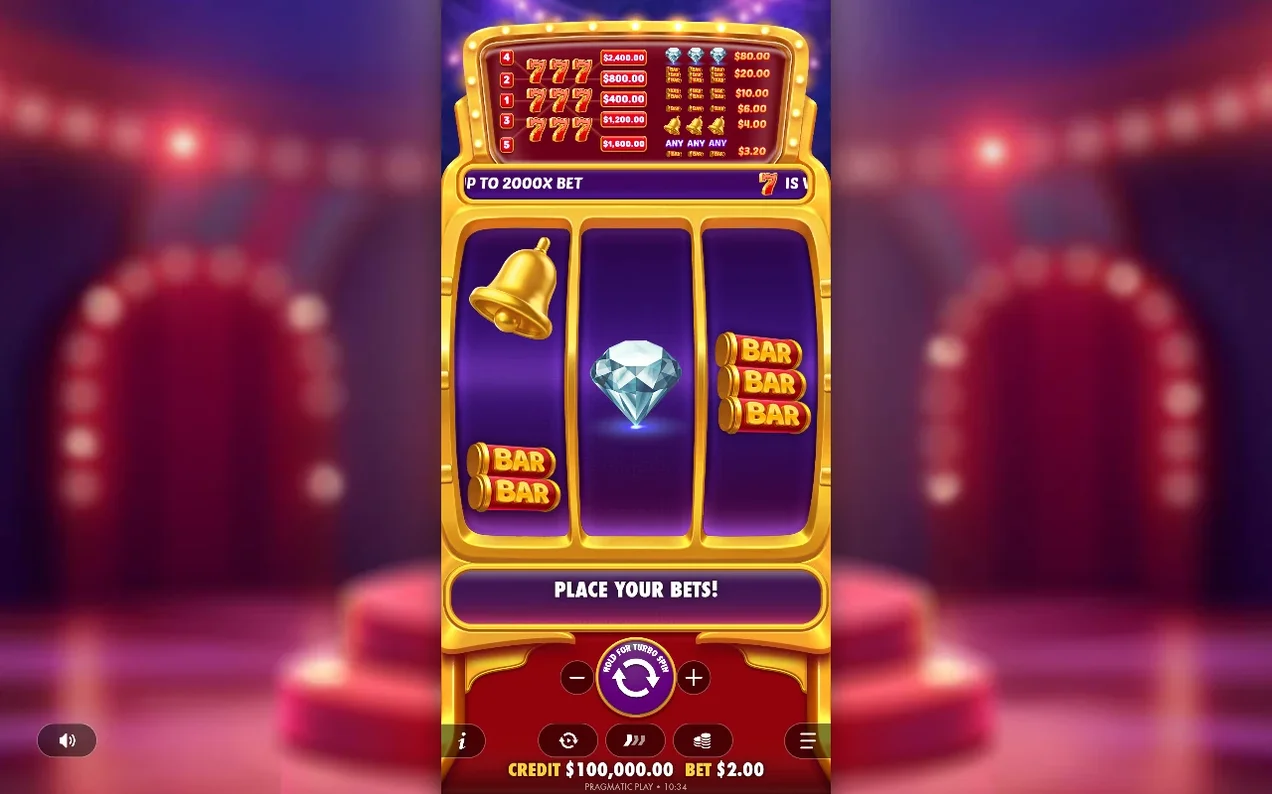 Bell, diamond and triple BAR symbols sit on the reels above the Place Your Bets banner.